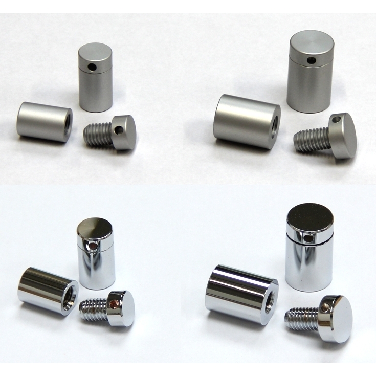 Eight stand-off sign fixing clamps in a chrome and satin finish, placed next to each other, in various different sizes, some with the clamp fronts/heads unscrewed.