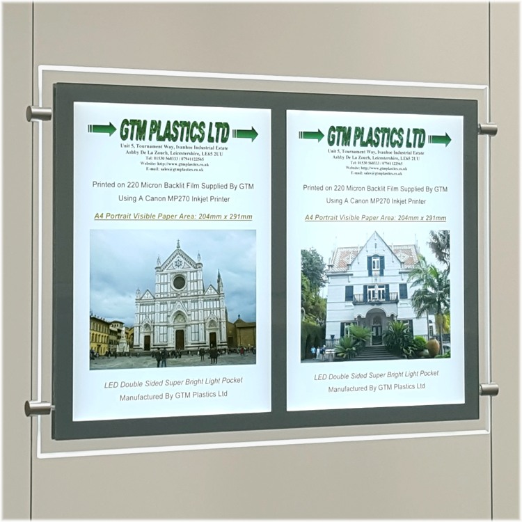 A4 Double width lightbox plugged in and displaying posters