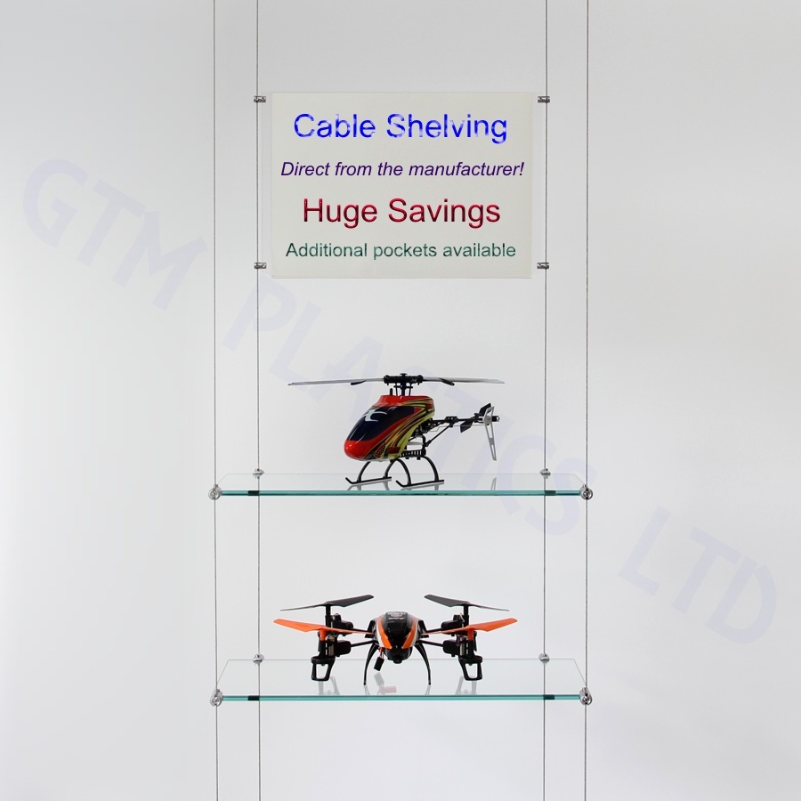 Glass wire suspended shelving displaying crockery with an optional poster holder between the cables