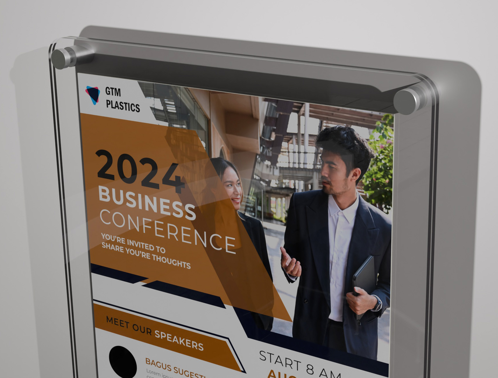 A poster sandwiched between two acrylic panels which have rounded corners. The photo is zoomed in to show a closeup of the corners.